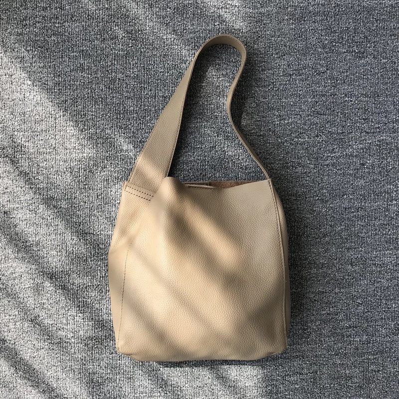 Relaxed Modern Look Fashion Forward Minimalist Pebbled Cowhide Leather Bucket  Bag, Wide Shoulder Strap Bucket Bag