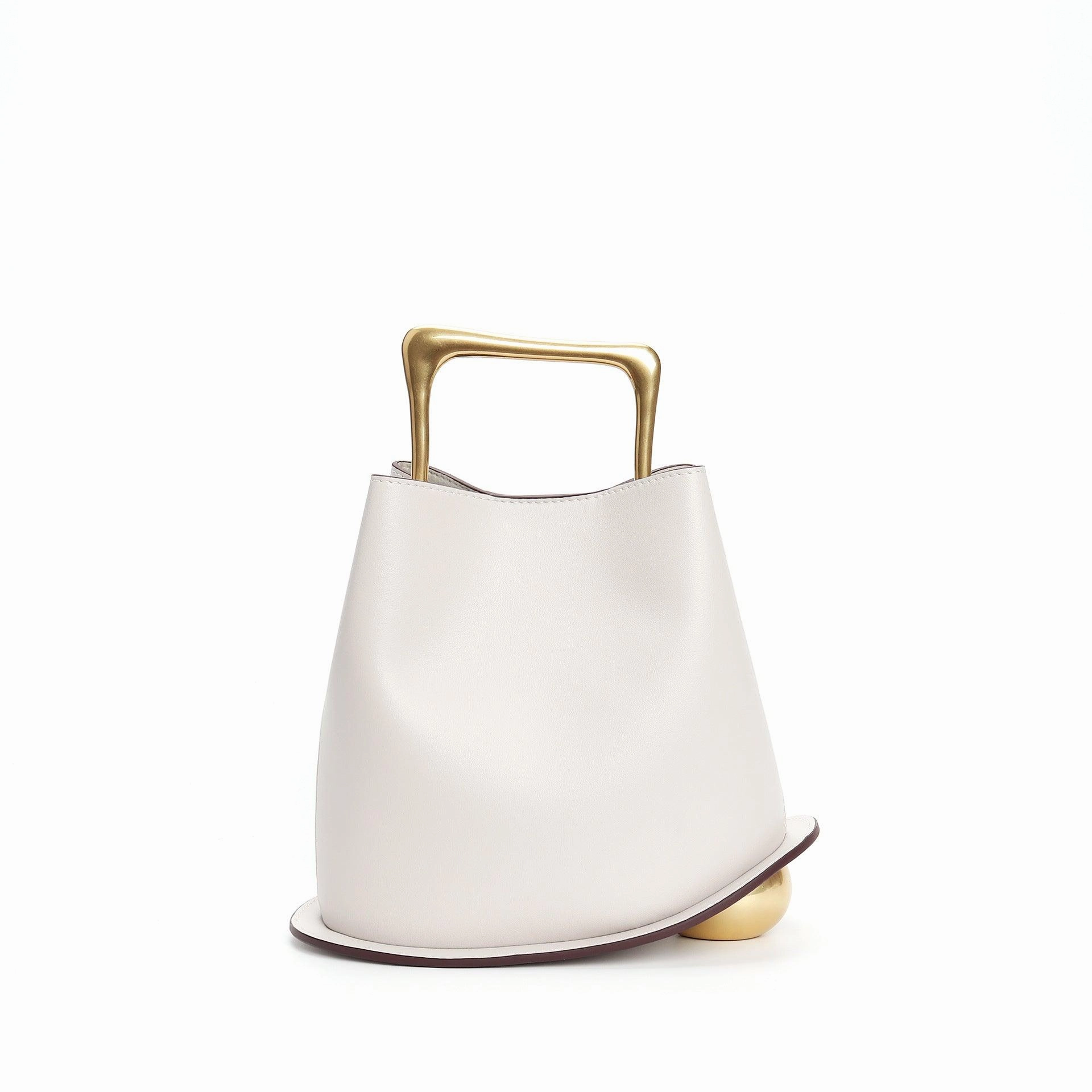 IT Ozzy Bag | Modern Chic Leather Shoulder Bucket Bag with Amber Acrylic Handles Casual Street Outfit