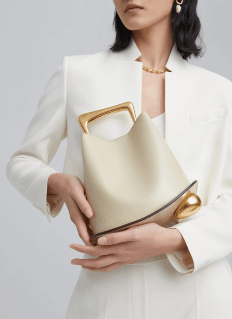 IT Ozzy Bag | Modern Chic Leather Shoulder Bucket Bag with Amber Acrylic Handles Functional Everyday Bag Timeless Everyday Use