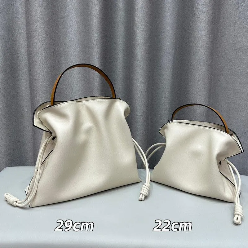 Compact Fit Minimal Style Luxurious Minimalist Soft Calfskin Bucket Bag | Shoulder Bag and Crossbody Bag for Women with Drawstring Closure