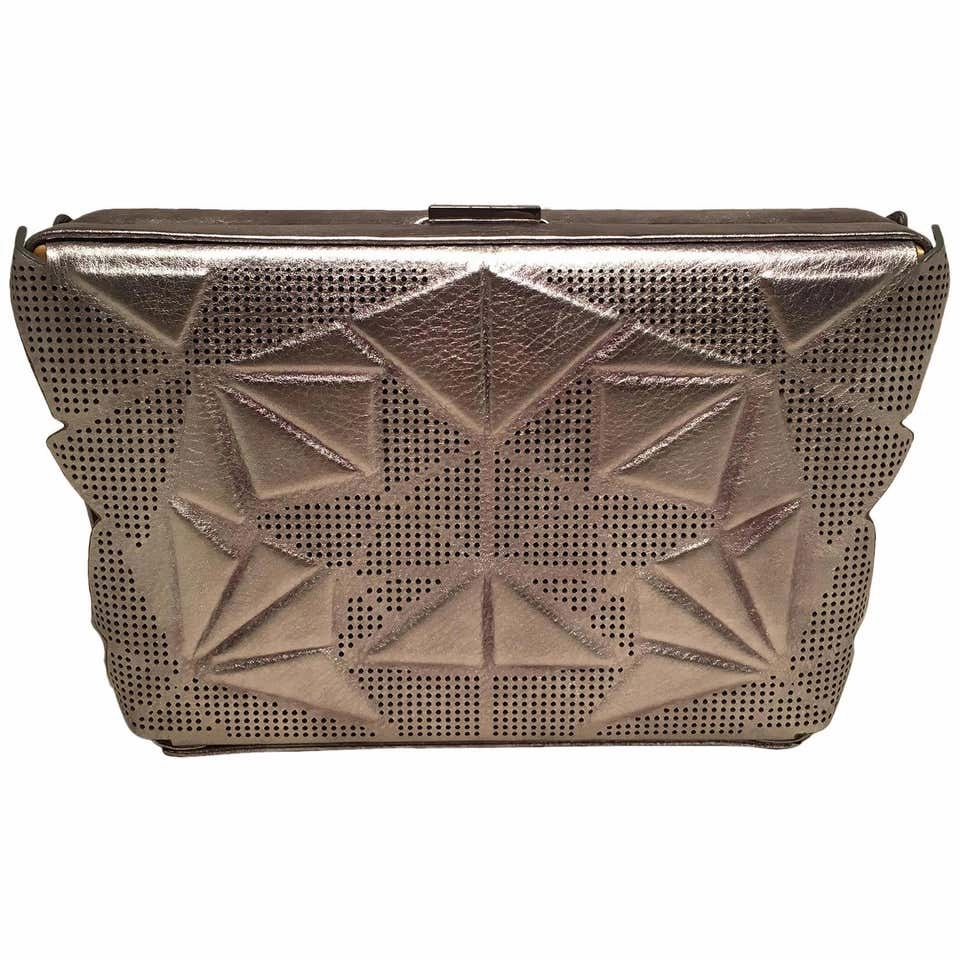 Tonya Hawkes Silver Metallic Embossed and Laser Cut Leather Convertible Clutch Signature Look Classic Appeal